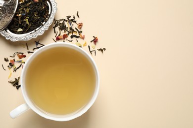 Photo of Flat lay composition with green tea on beige background. Space for text