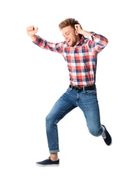 Photo of Full length portrait of happy handsome man jumping on white background