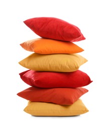 Stack of different colorful pillows on white background