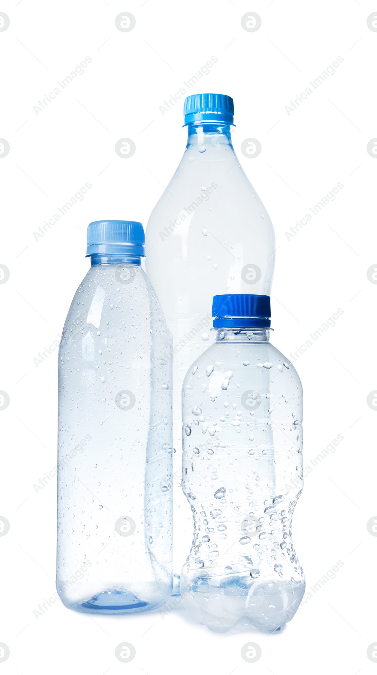 Photo of Empty plastic bottles on white background. Recycling problem