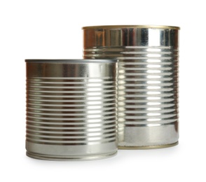 Photo of Closed tin cans isolated on white, mockup for design