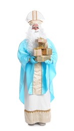 Photo of Full length portrait of Saint Nicholas with presents on white background