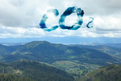 Image of Concept of clear air. CO2 inscription and beautiful mountain landscape