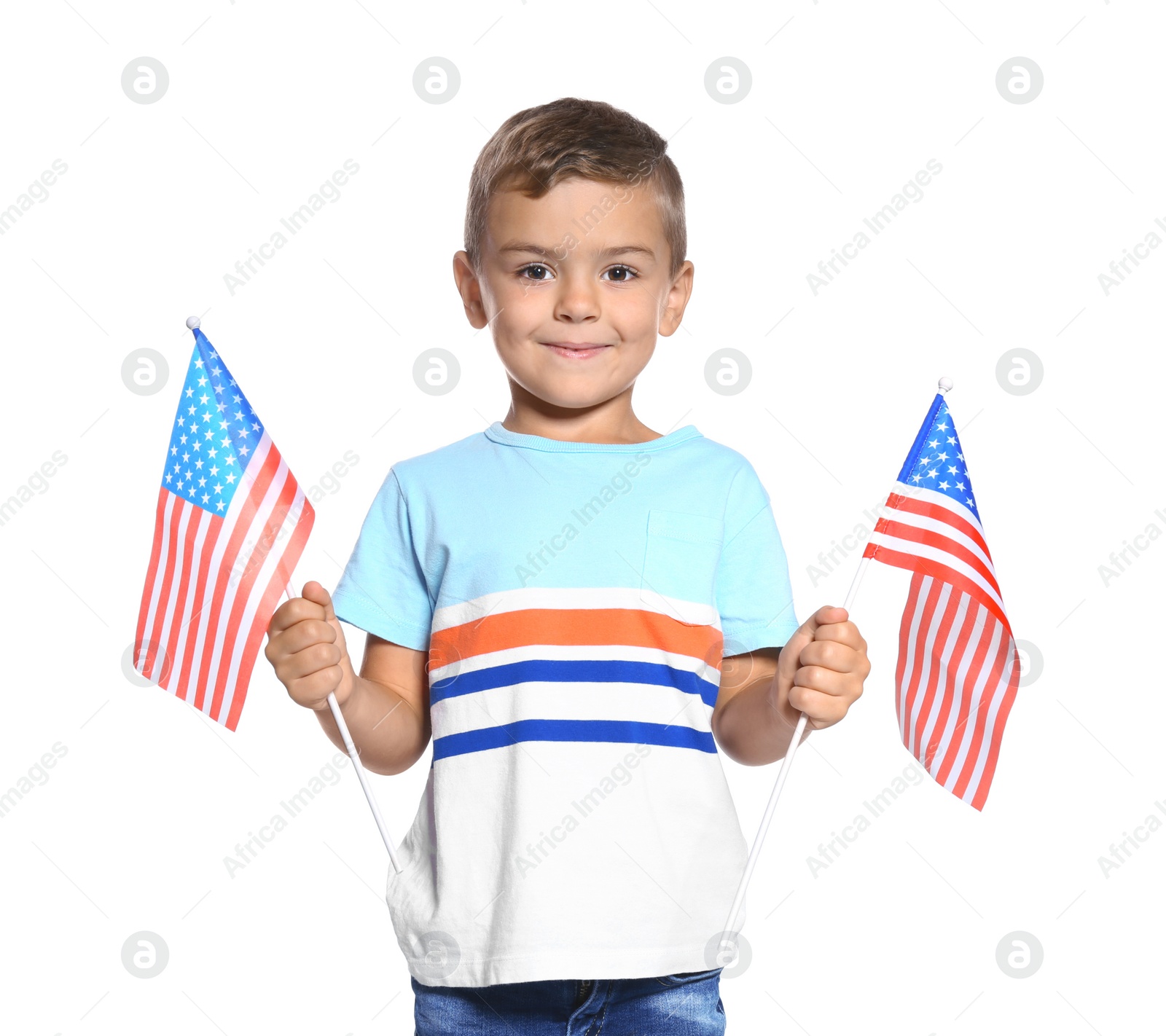 Photo of Little boy with American flags on white background