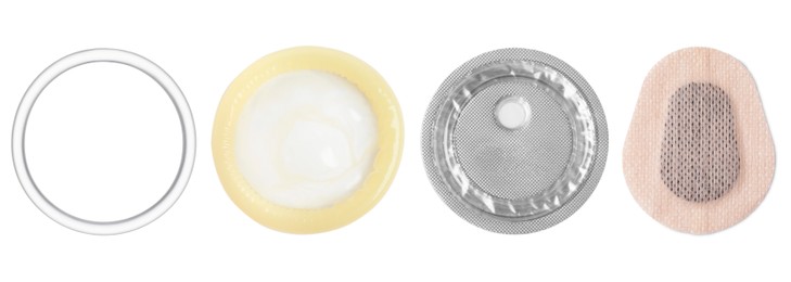 Image of Contraceptive patch, vaginal ring, condom and emergency pill isolated on white. Different birth control methods