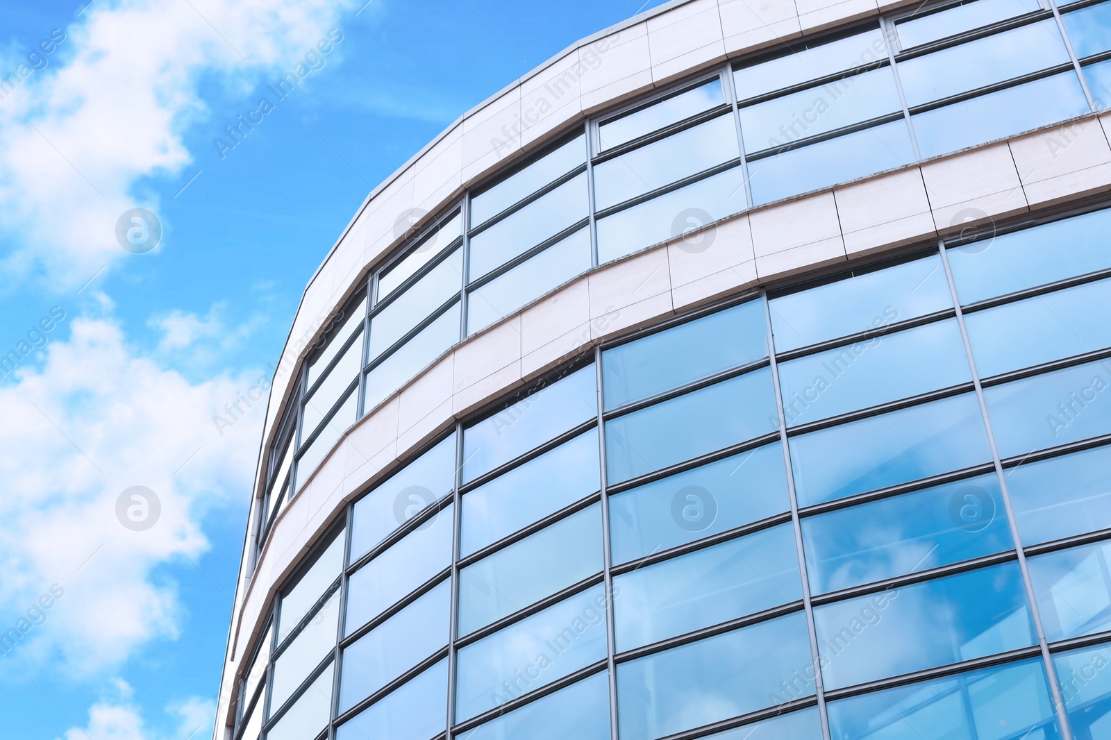 Photo of Building with tinted windows. Modern architectural design