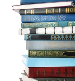 Stack of hardcover books on white background