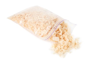 Photo of Natural sawdust with zip bag isolated on white