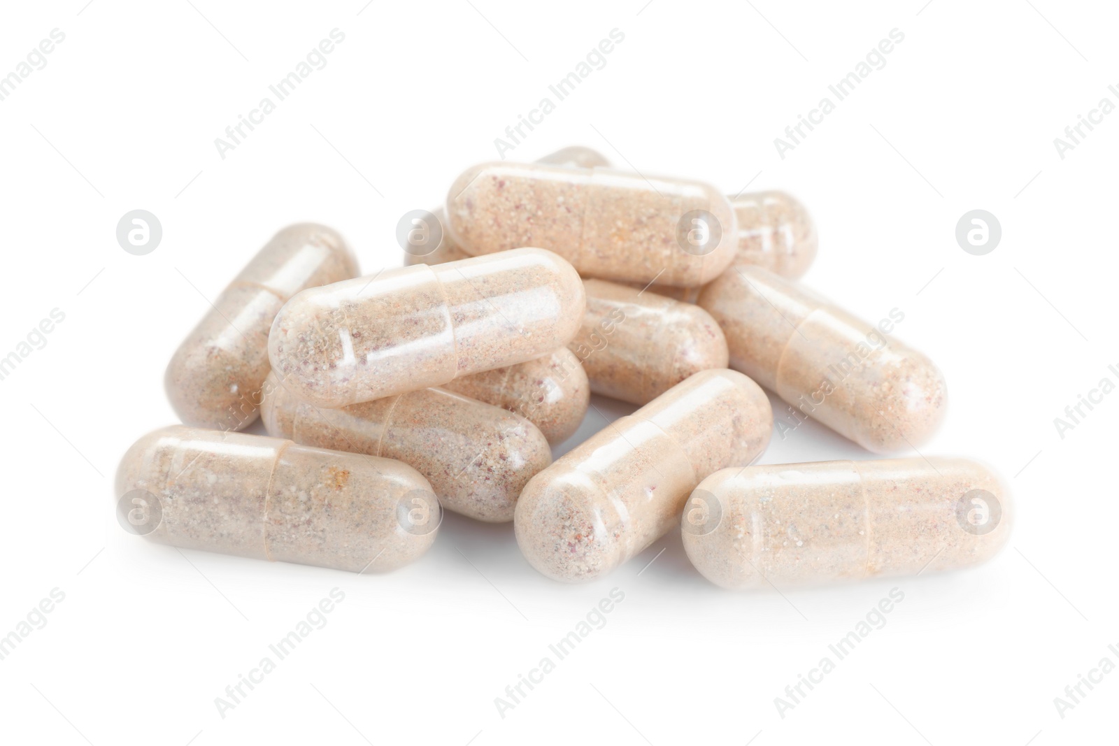 Photo of Many transparent gelatin capsules on white background