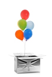 Photo of Gift box with bright air balloons isolated on white