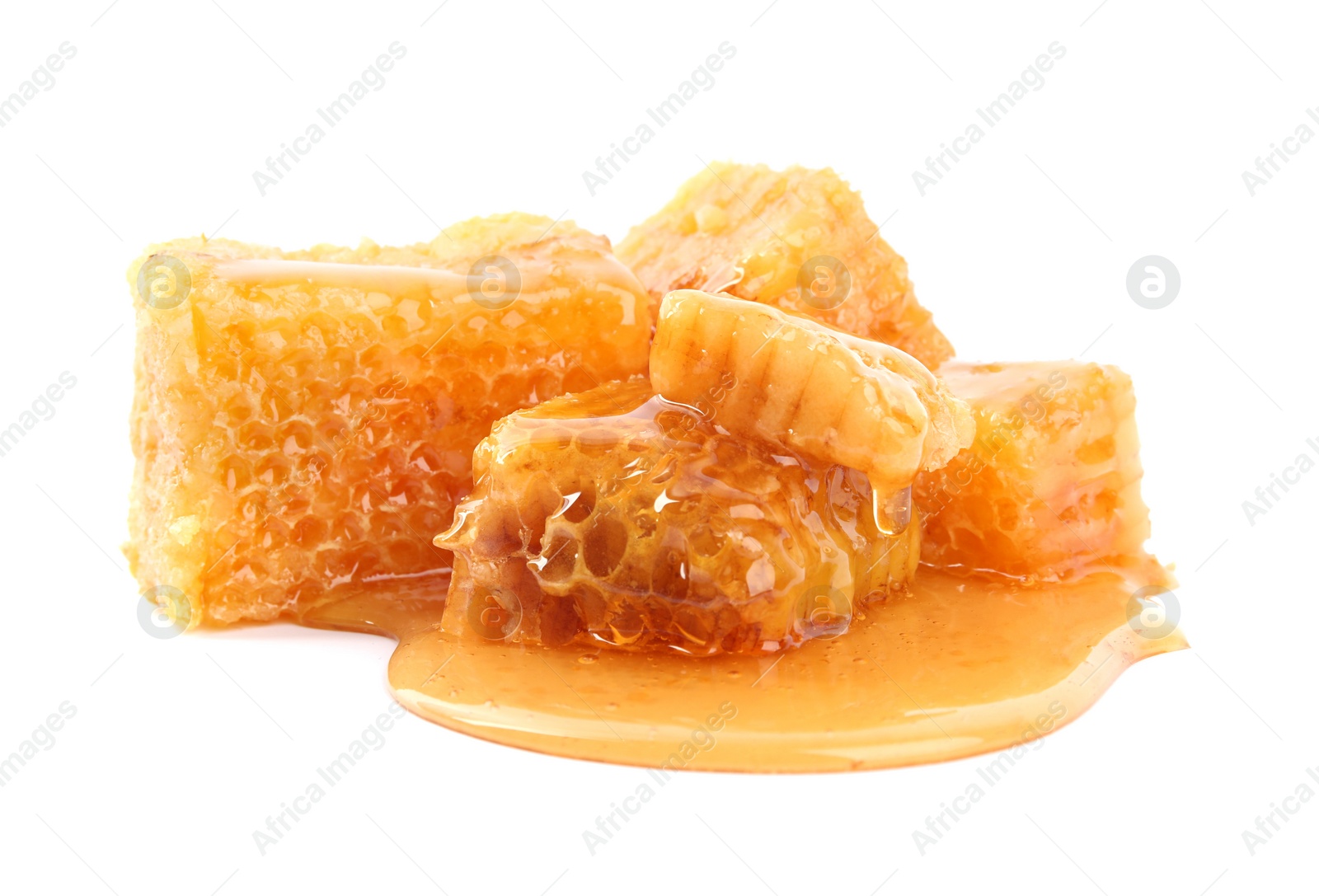 Photo of Pieces of tasty fresh honeycomb isolated on white