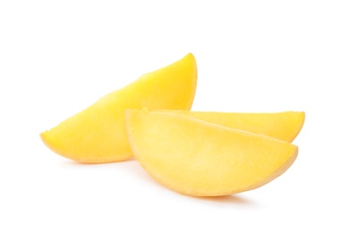 Fresh juicy mango slices isolated on white