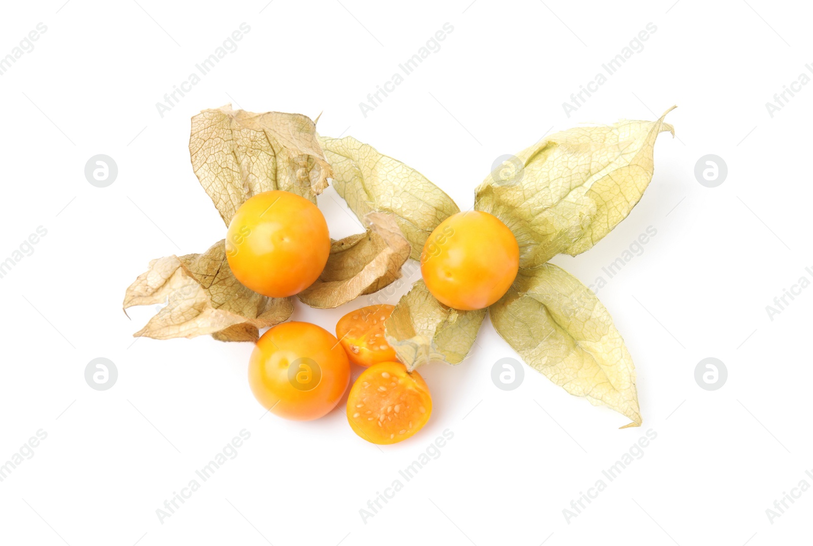 Photo of Many ripe physalis fruits with calyxes isolated on white, top view