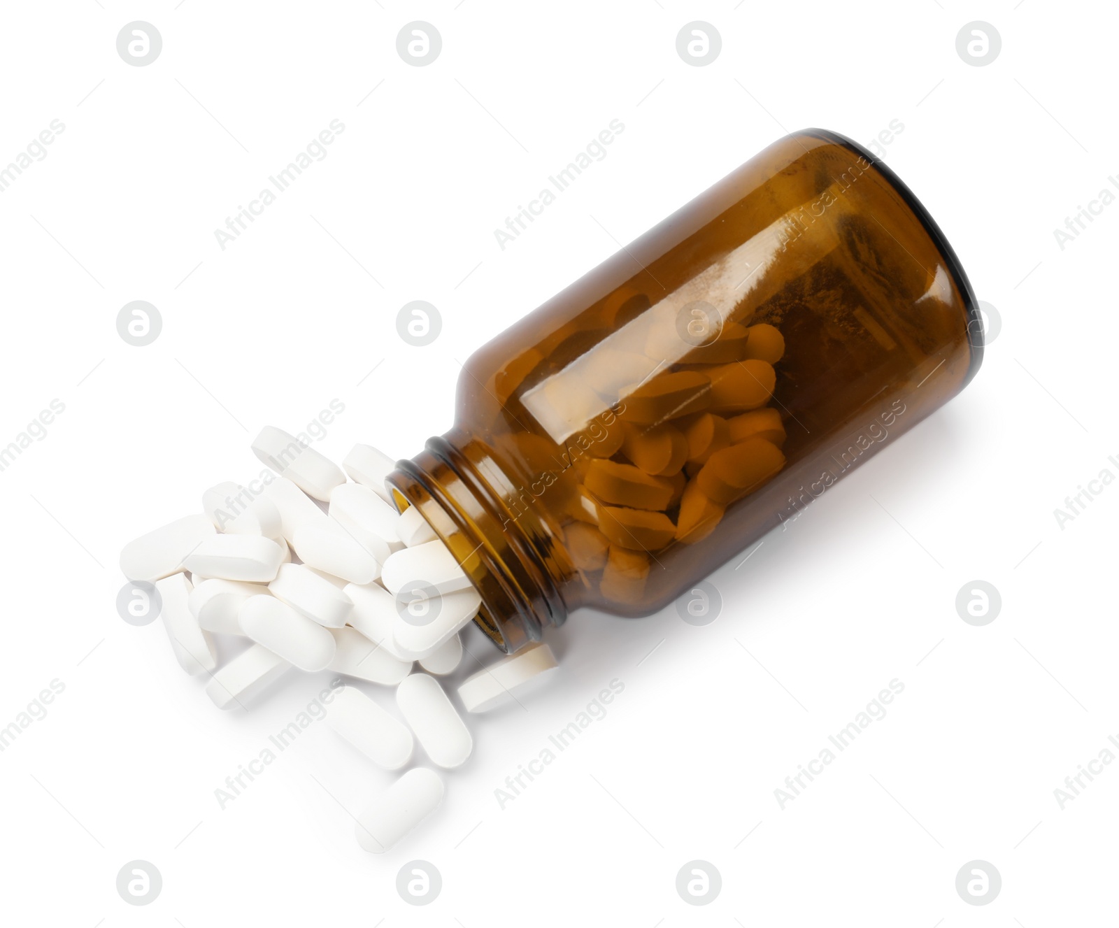 Photo of Bottle and vitamin pills isolated on white, top view