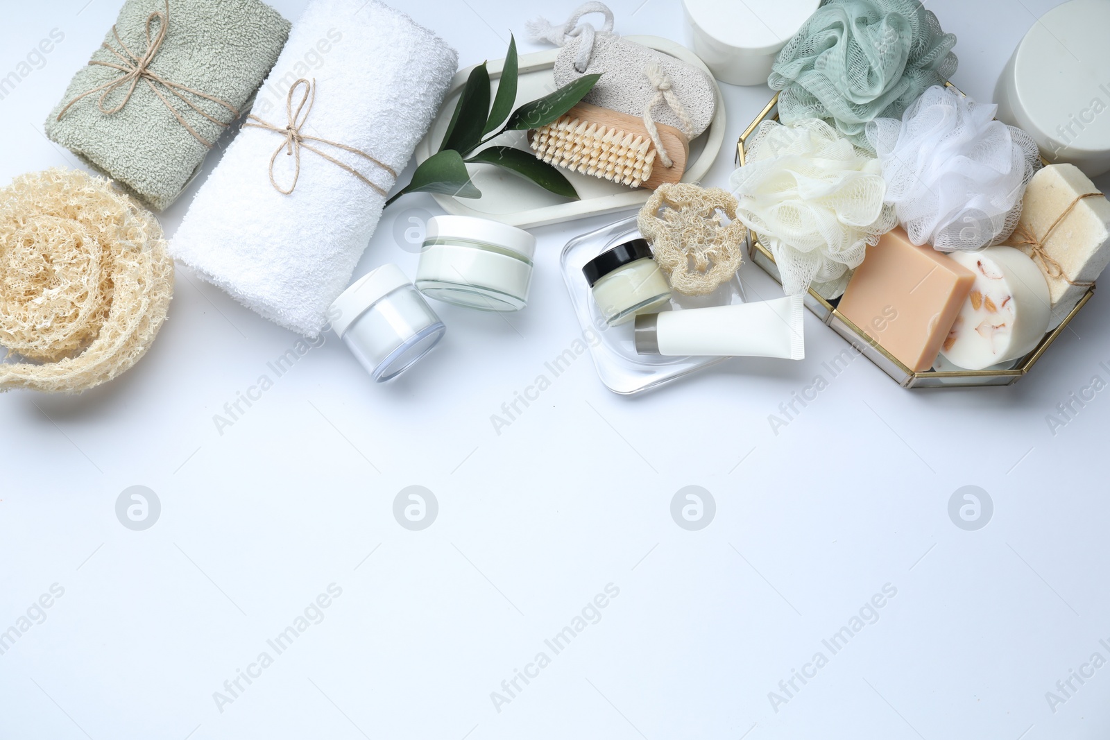 Photo of Bath accessories. Flat lay composition with personal care products on white background, space for text