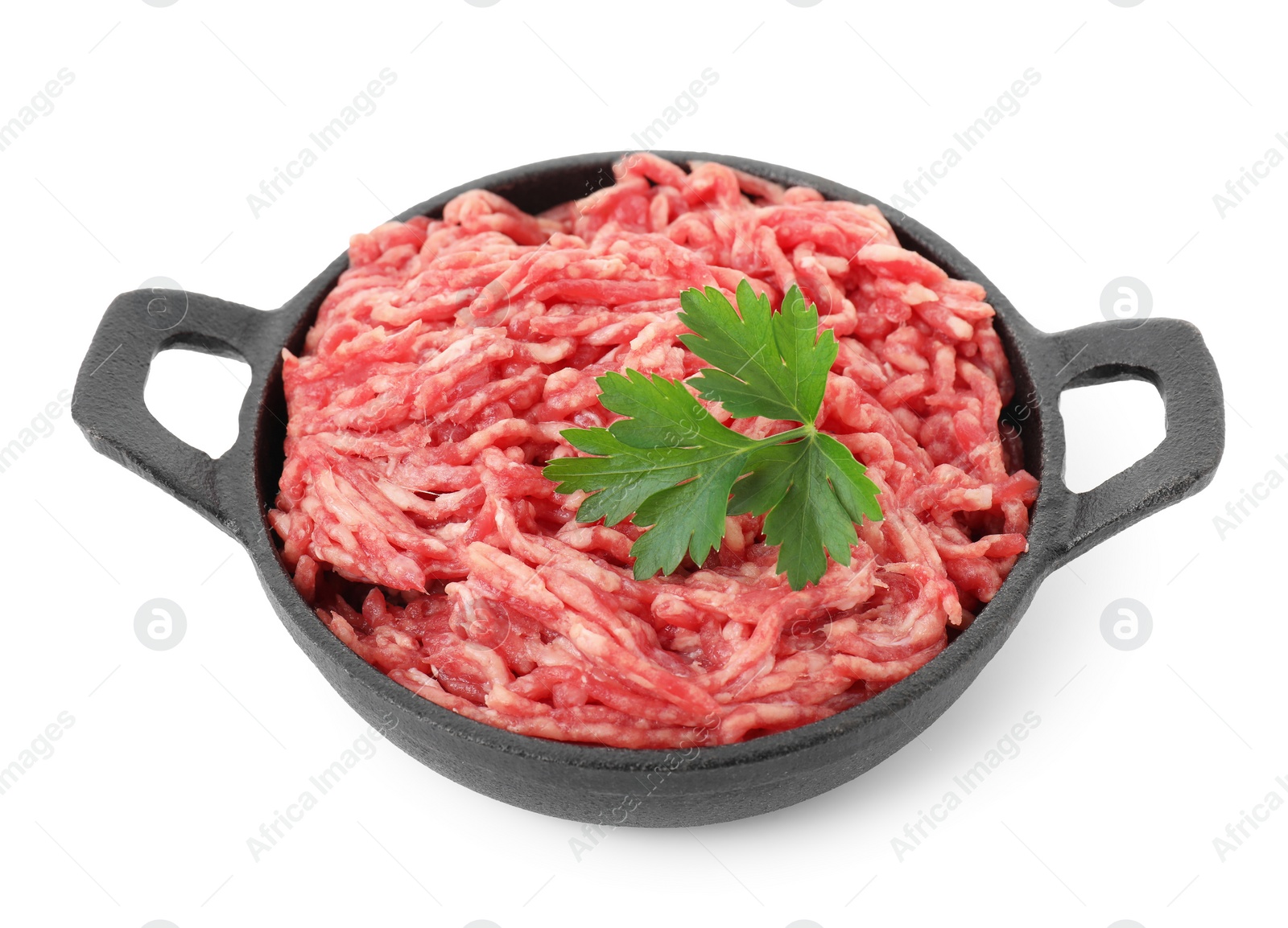 Photo of Raw ground meat and parsley in bowl isolated on white