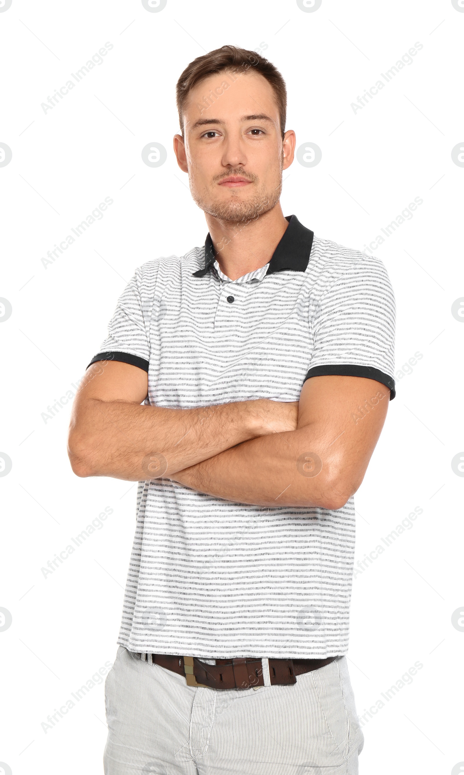 Photo of Young man in casual clothes posing on white background