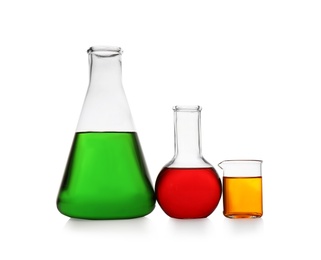 Photo of Chemistry glassware with color samples isolated on white