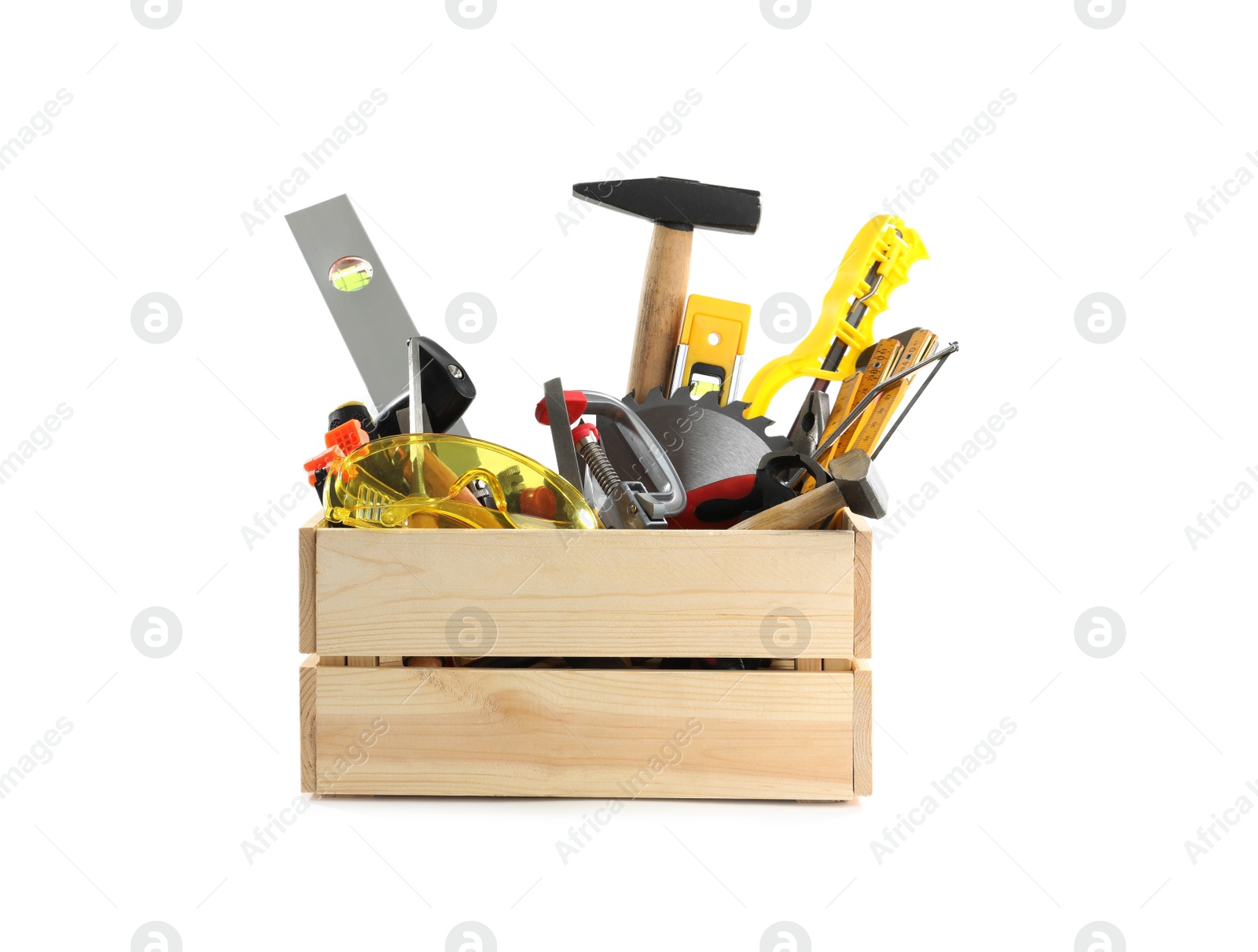 Photo of Wooden crate with different carpenter's tools isolated on white