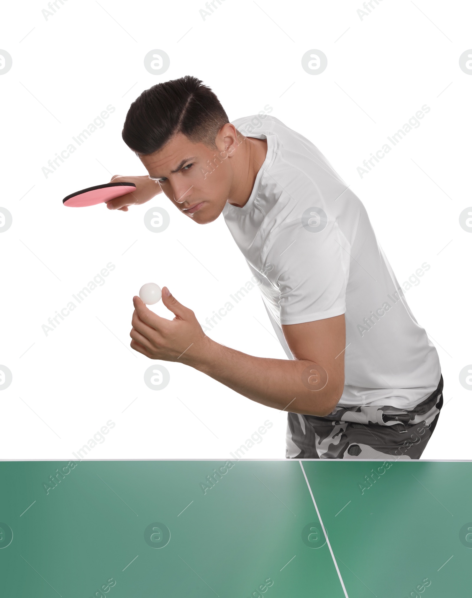 Photo of Handsome man playing ping pong on white background