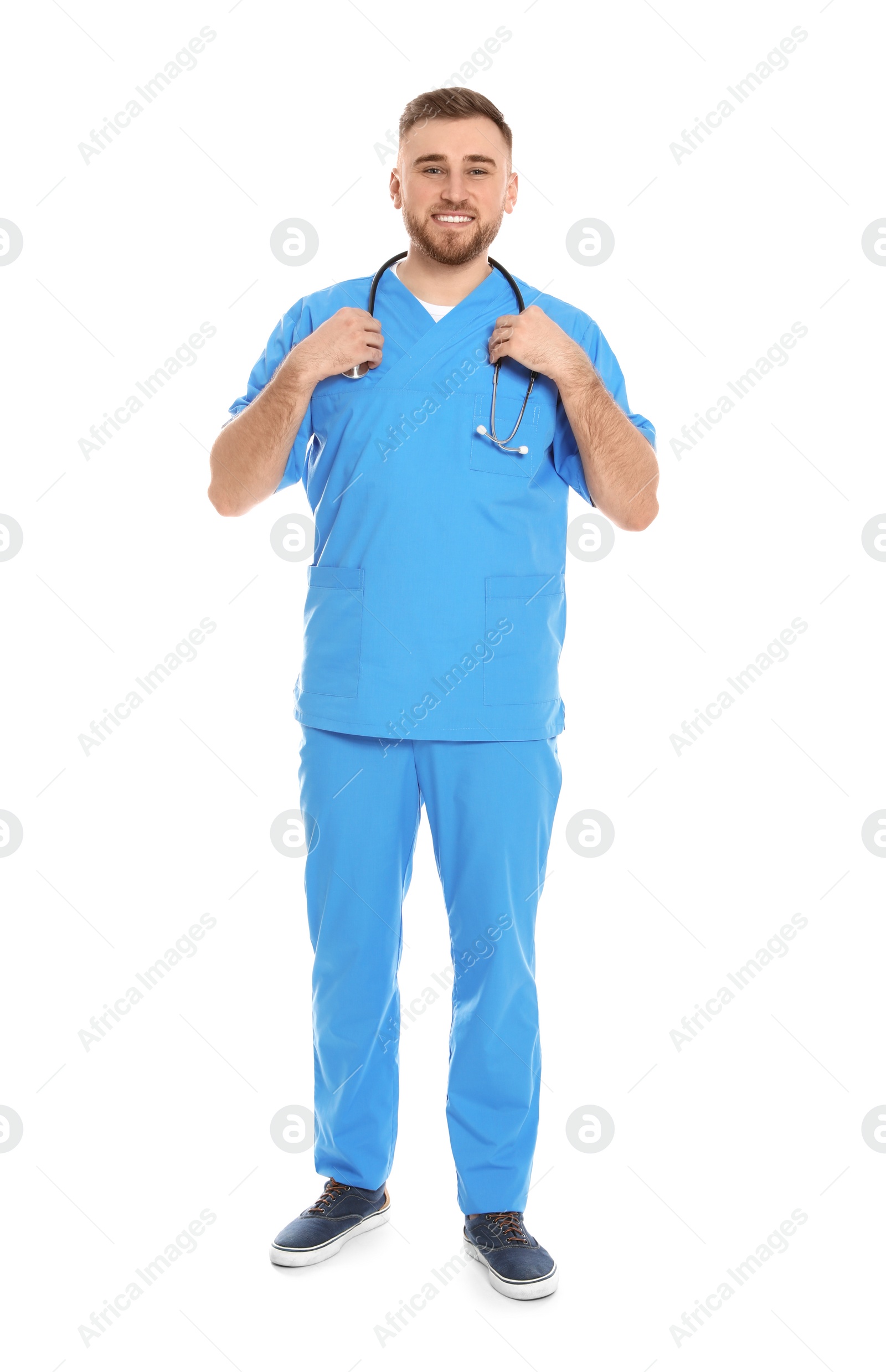 Photo of Full length portrait of medical doctor with stethoscope isolated on white