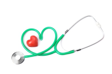 Photo of Red heart and stethoscope on white background, top view. Cardiology concept