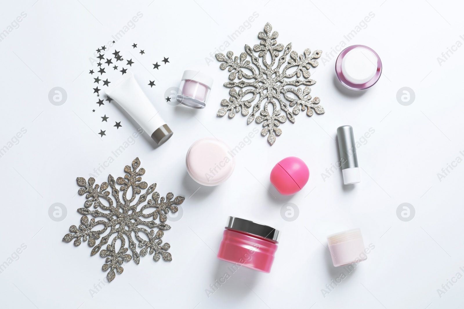 Photo of Set of cosmetic products on white background, flat lay. Winter care