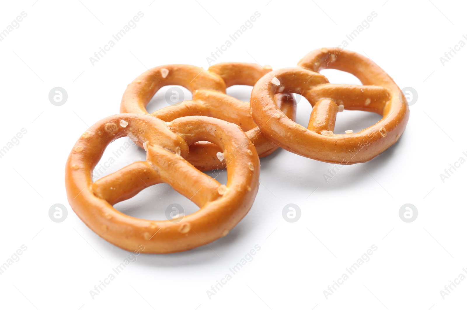 Photo of Delicious crispy pretzel crackers isolated on white