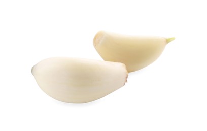 Peeled cloves of garlic isolated on white