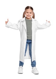 Photo of Little girl in medical uniform showing thumbs up on white background