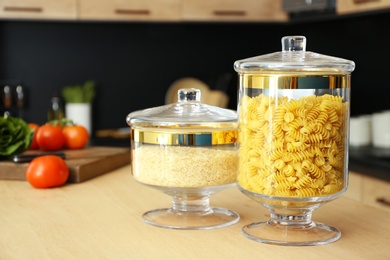 Photo of Products on wooden table in modern kitchen