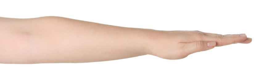 Photo of Playing rock, paper and scissors. Woman showing paper sign on white background, closeup