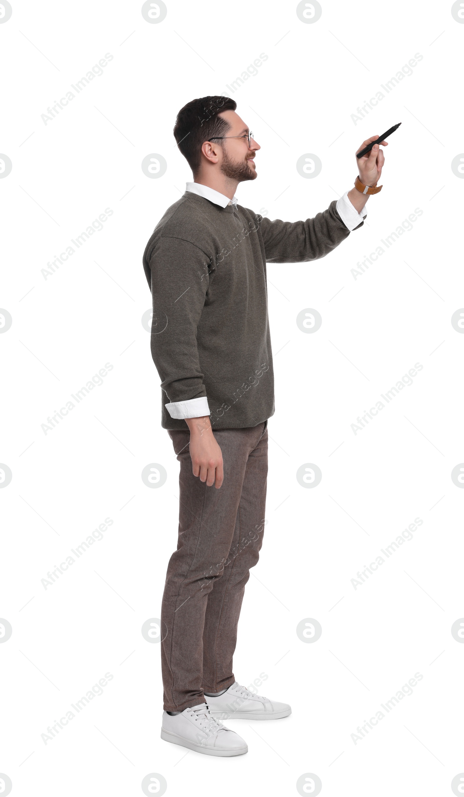 Photo of Handsome bearded businessman with marker on white background