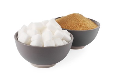 Bowls with granulated and refined sugar on white background