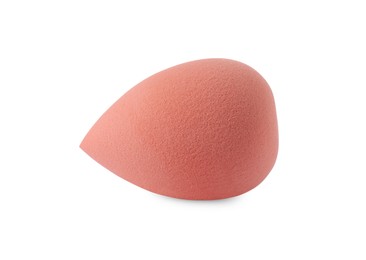 Photo of One coral makeup sponge isolated on white