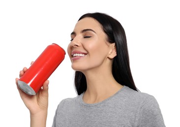 Photo of Beautiful happy woman drinking from red beverage can on white background