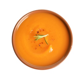 Photo of Bowl of tasty sweet potato soup isolated on white, top view
