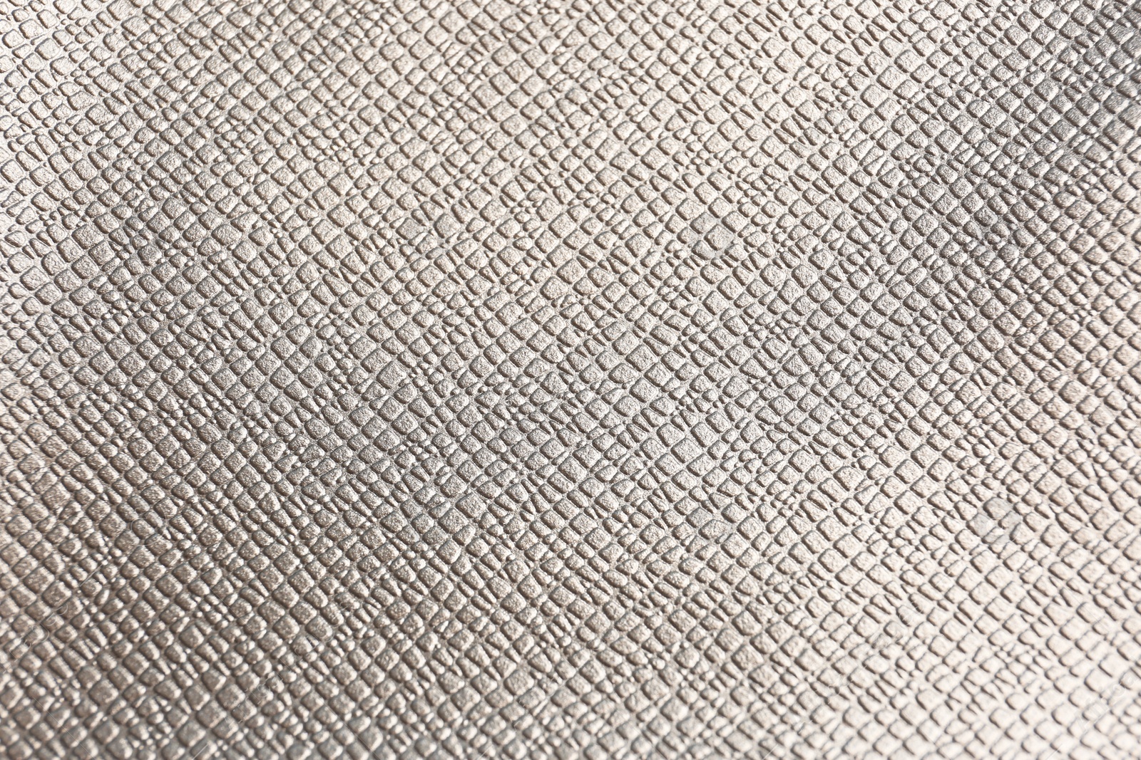 Photo of Texture of rose grey leather as background