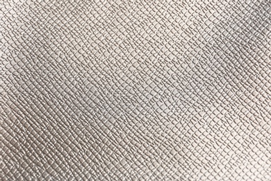 Photo of Texture of rose grey leather as background