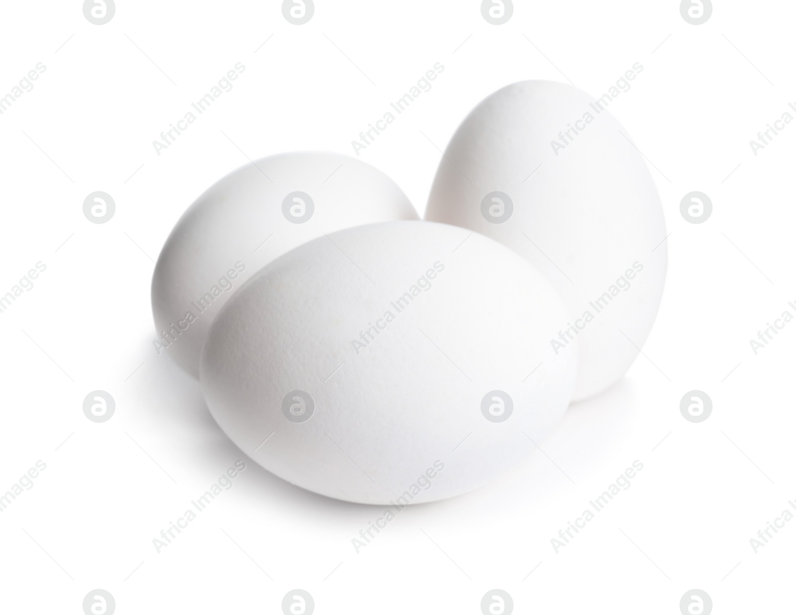 Photo of Fresh raw chicken eggs isolated on white