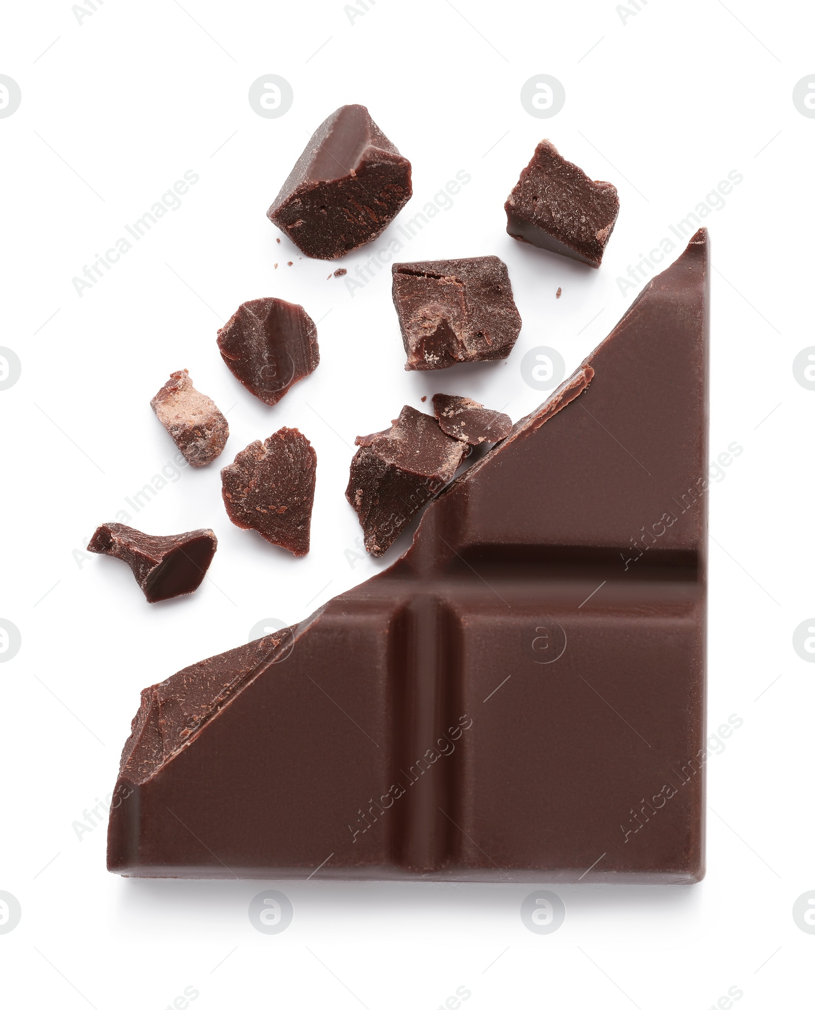 Photo of Pieces of delicious dark chocolate bar on white background, top view