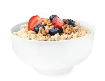 Photo of Tasty oatmeal with strawberries, blueberries and walnuts in bowl isolated white