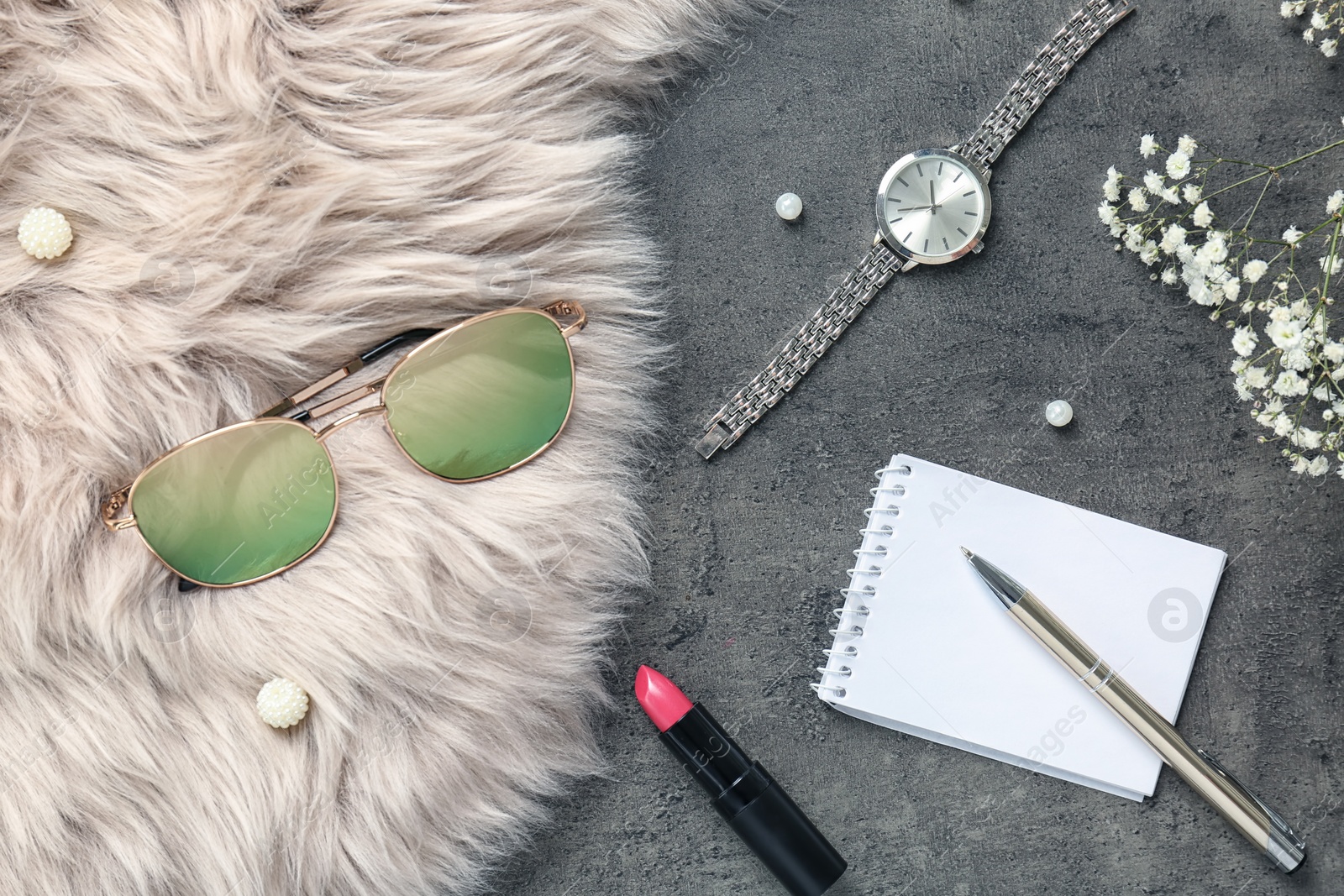 Photo of Flat lay composition with cosmetics and stylish accessories on grey background