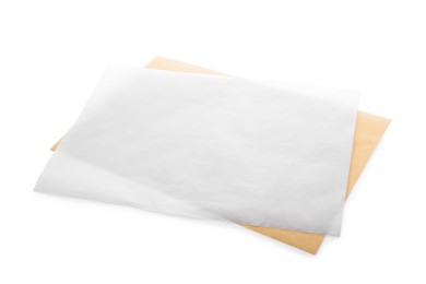 Photo of Sheets of baking paper on white background