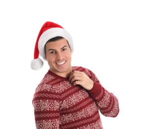 Handsome man wearing Santa hat on white background