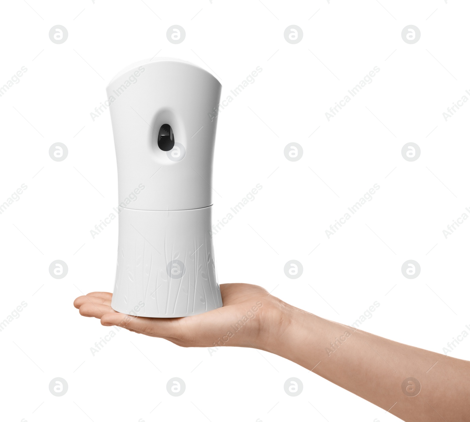 Photo of Woman holding automatic air freshener on white background