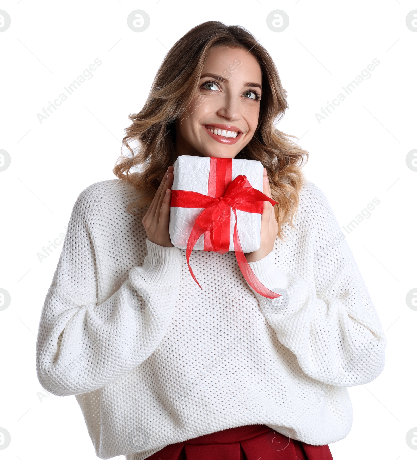 Photo of Beautiful young woman with Christmas present on white background