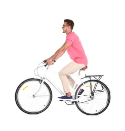 Photo of Handsome young hipster man riding bicycle on white background