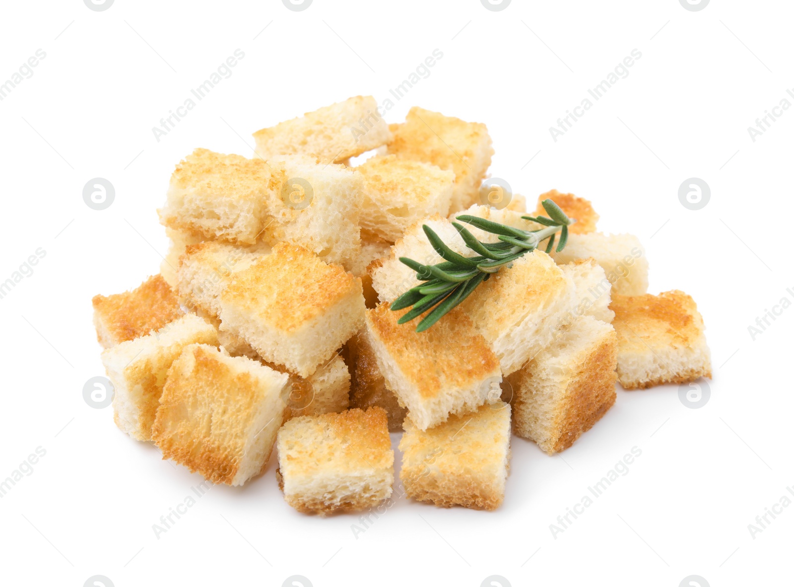 Photo of Delicious crispy croutons with rosemary on white background