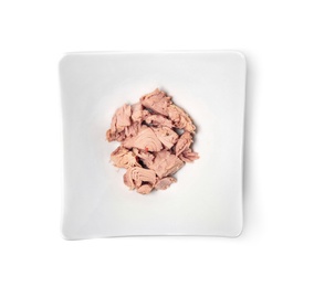 Plate with canned tuna on white background, top view